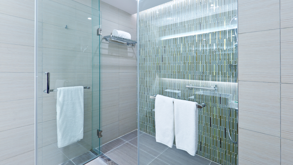 glass panel shower walls and door with no sill