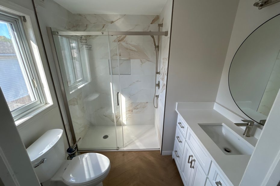 a bathroom with a shower and sink